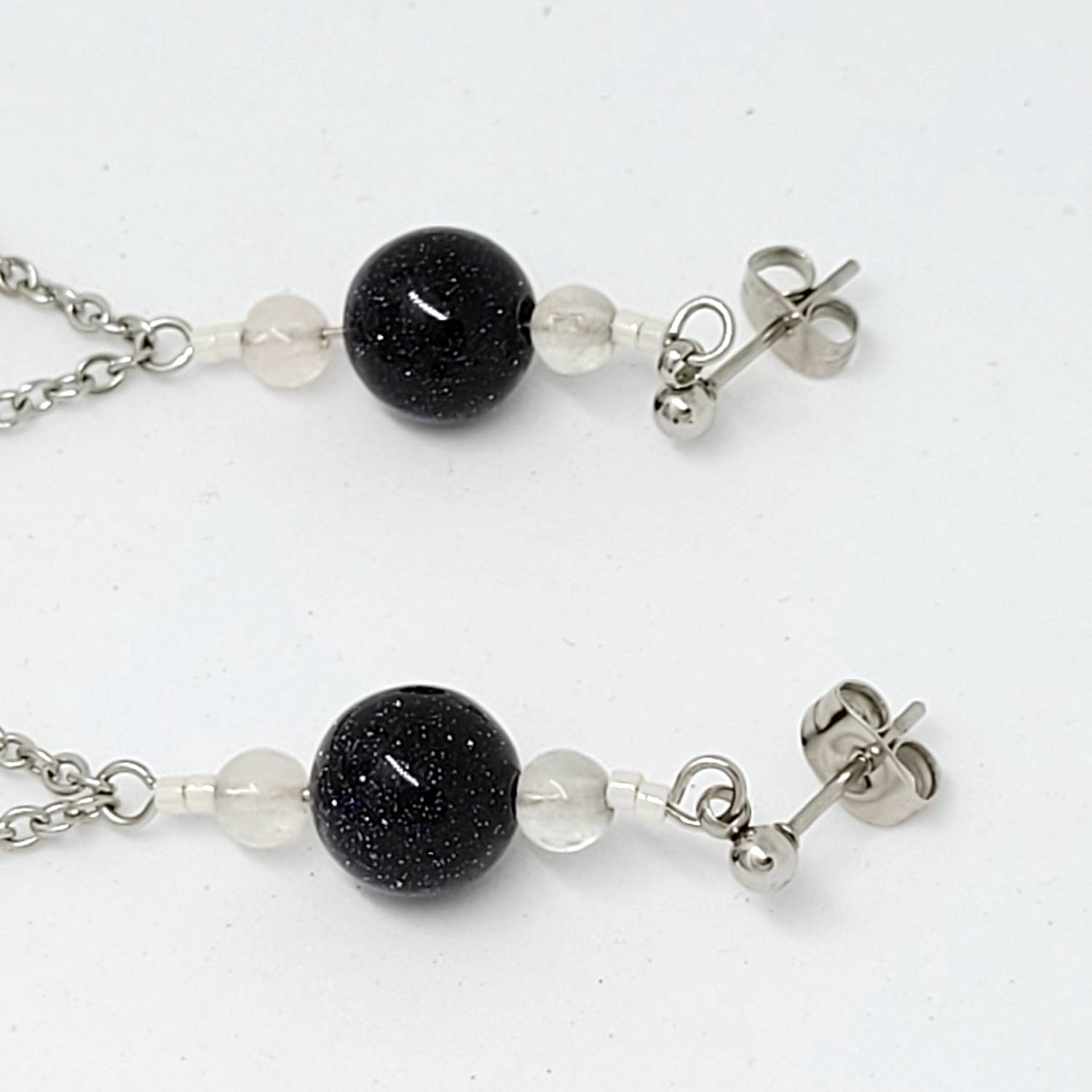 Boucles d'oreilles longues avec Pierre de Soleil et Nacre de Tahiti – Image 2